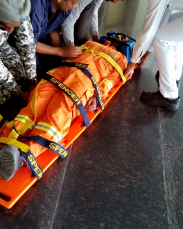 Practical use of rigid stretcher to move victim of spinal injury